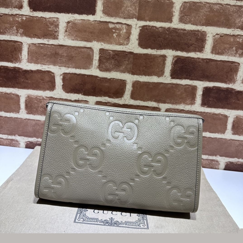 G*u*i clutch bags